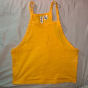 Bright yellow cropped halter top